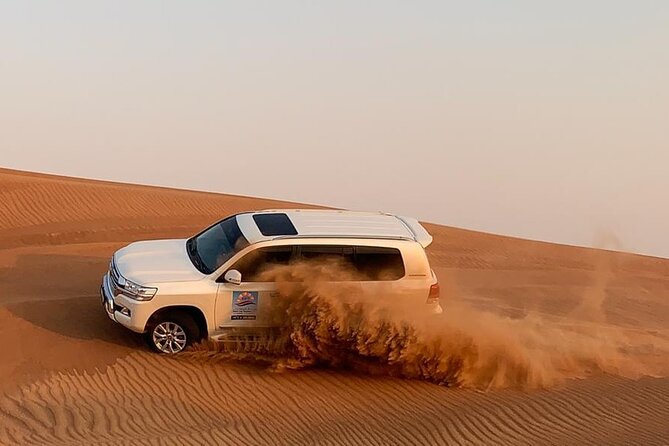 Dubai Evening Desert Safari With Camel Ride, Sand Boarding, BBQ & Entertainment - Camel Ride and Sand Boarding