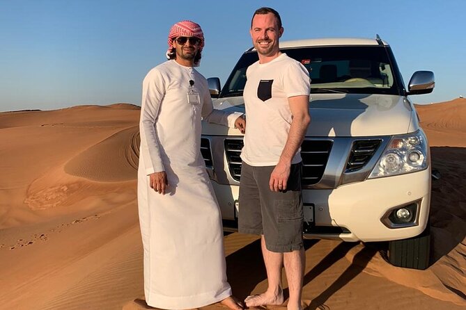 Dubai: Unique SUNSET 4WD Red Dunes Safari - Camel Ride Experience