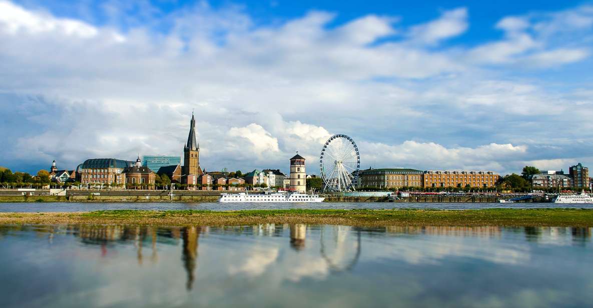 Dusseldorf: Express Walk With a Local in 60 Minutes - Dusseldorfs Historical Landmarks