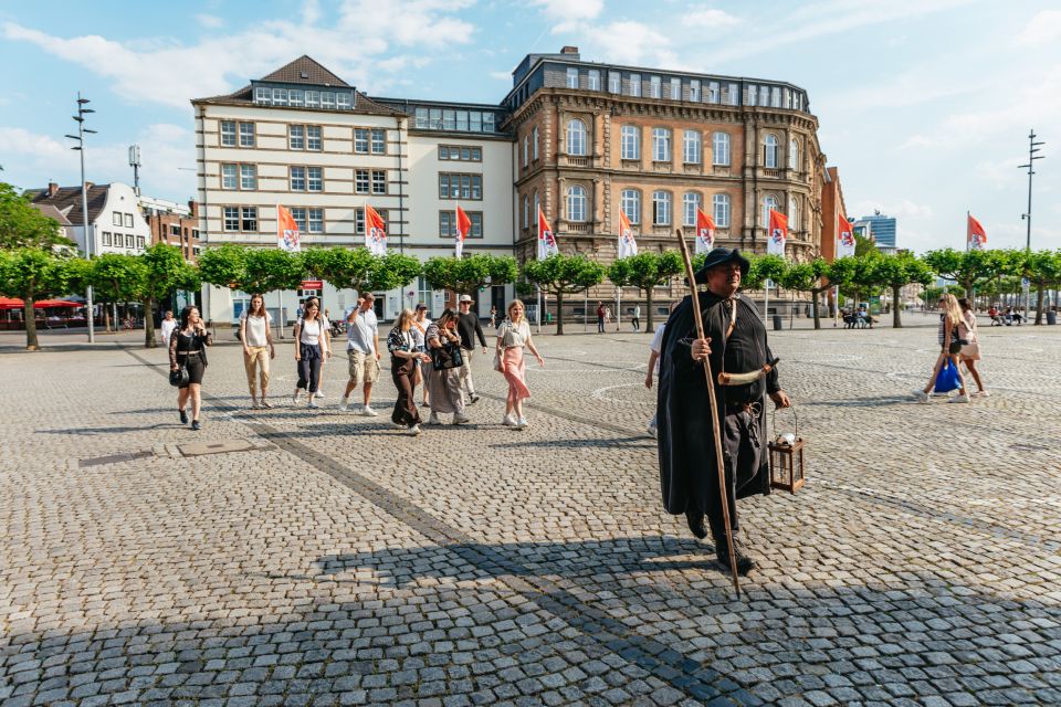 Düsseldorf: Guided Tour With a Night Watchman - Landmark Attractions in Altstadt