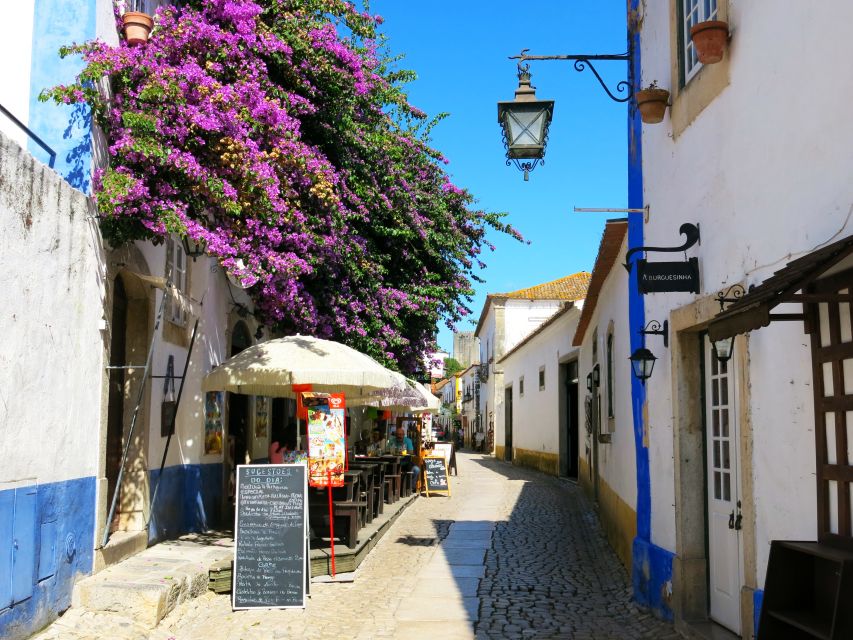 From Lisbon: Private Óbidos Sightseeing Tour - Bacalhôa Buddha Eden