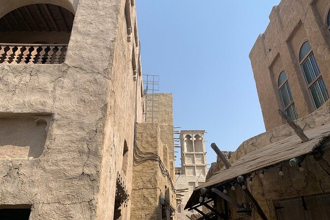 Historical Dubai Walking Tour With Local - Bustling Souks and Textiles