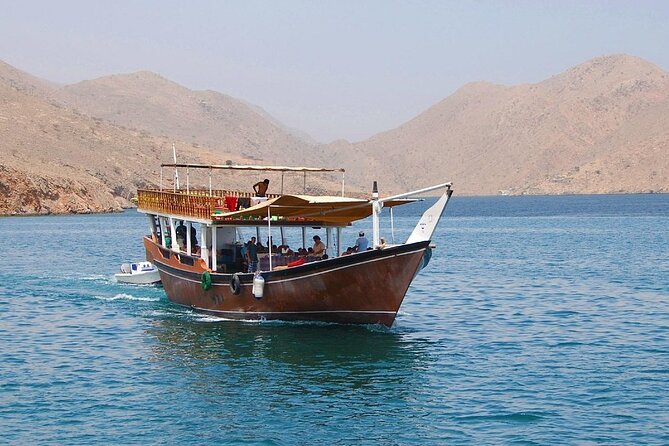 Khasab Musandam Full Day Dhow Cruise With Lunch and Snorkeling - Spotting Playful Dolphins