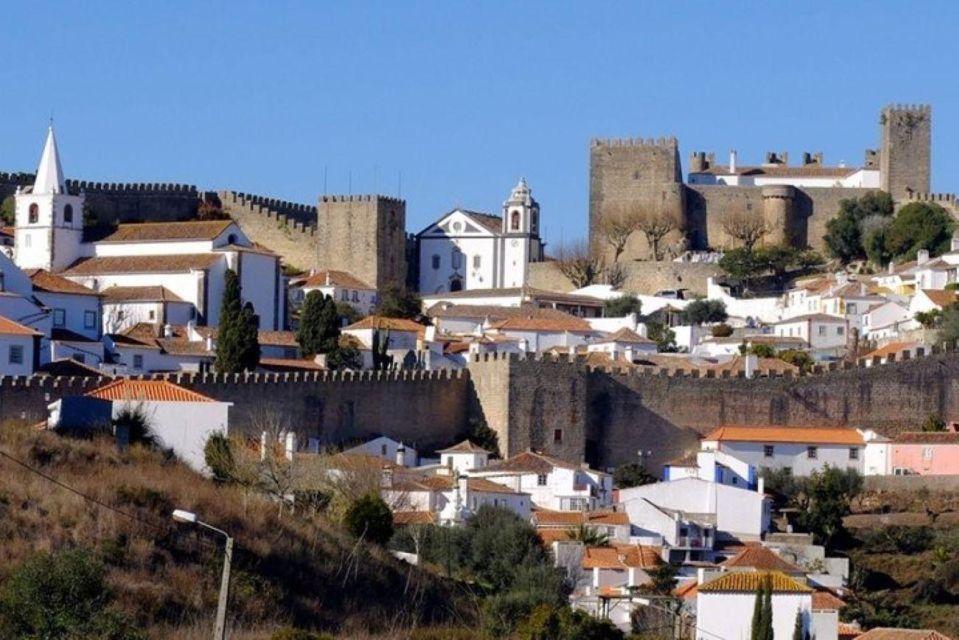 Lisbon: Fátima, Batalha Monastery, Nazaré and Óbidos Tour - Monastery Architectural Wonders