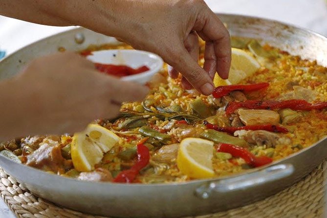 Paella Seafood Master Class Experience in Barcelona - Hosts and Teaching Style