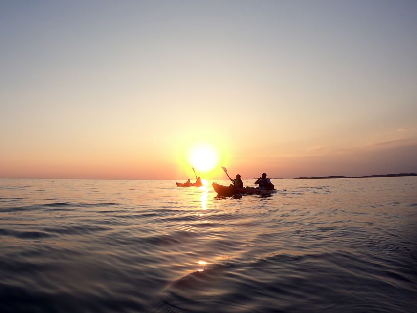 Pula: Sunset Kayak Tour With Snorkeling and Cliff Jumping - Highlights and Activities