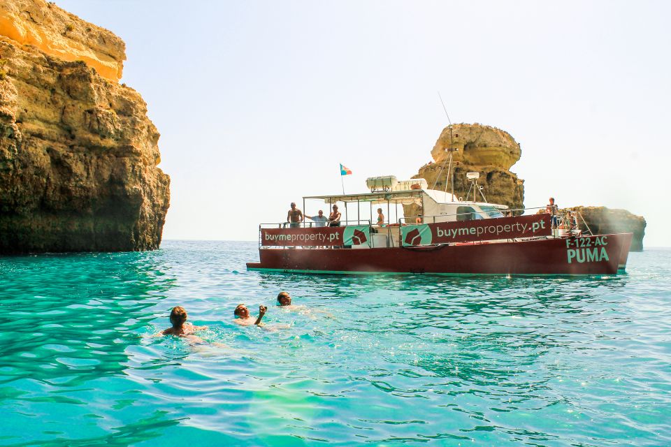 Quarteira: Benagil Cave Guided Catamaran Day Cruise & Drink - Included Amenities and Experiences