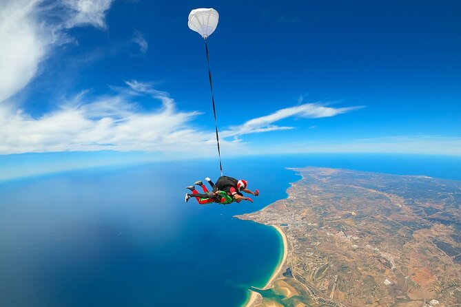 Tandem Skydiving 15,000ft - W/ Shuttle From Faro - Meeting and Pickup