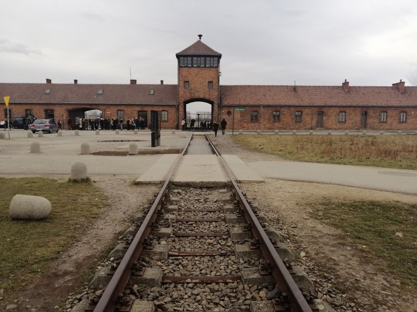 Warsaw: Tour to Krakow and Auschwitz by Train With Pickup - Krakow Exploration