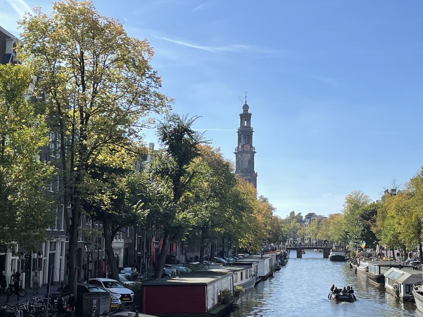 Amsterdam: Guided Off-The-Beaten-Track Walking Tour - Architectural Marvels and Markets