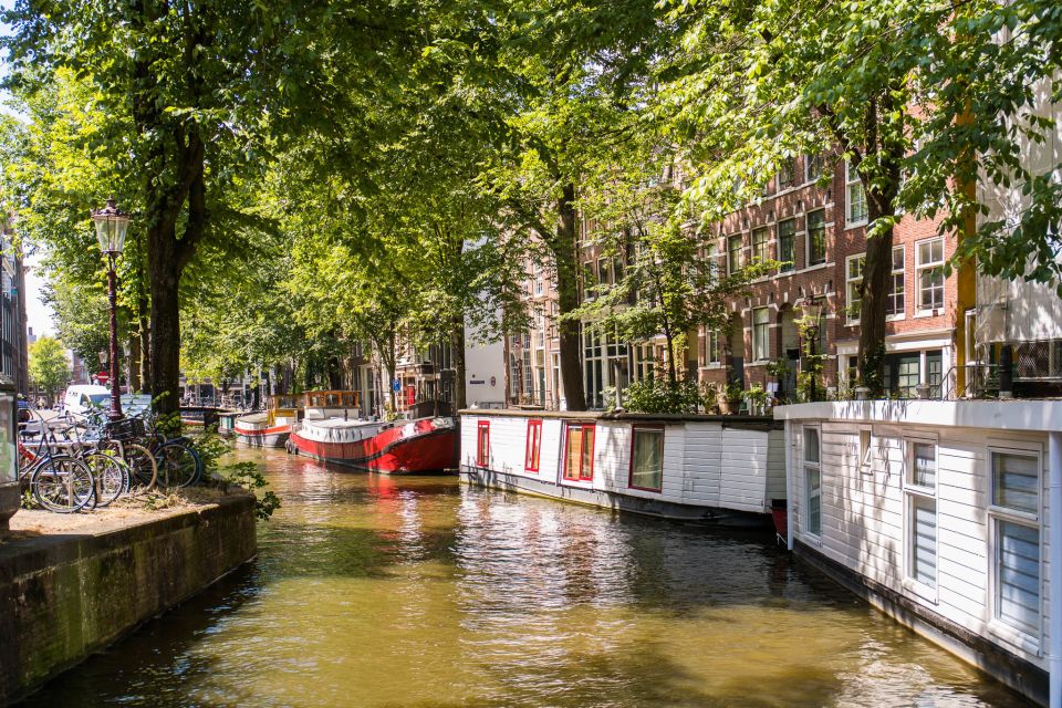 Amsterdam: Semi-Open Canal Boat Cruise - Meeting Point and Accessibility