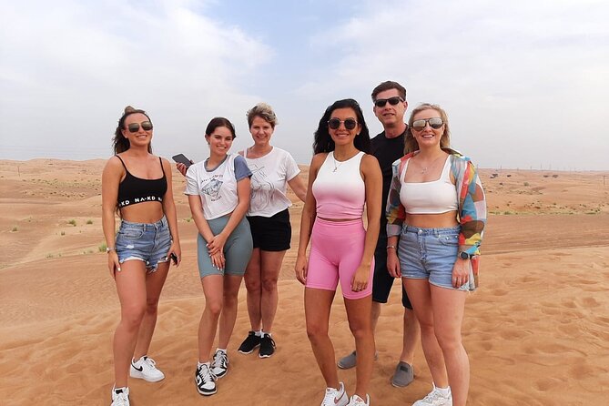 Dubai Desert Safari: Quad Bike, Camel Ride and BBQ Dinner - Engaging Sand Boarding Activity