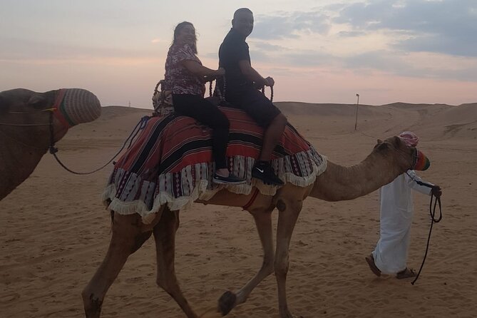 Dubai: Unique SUNSET 4WD Red Dunes Safari - Quad Bikes and Falcons