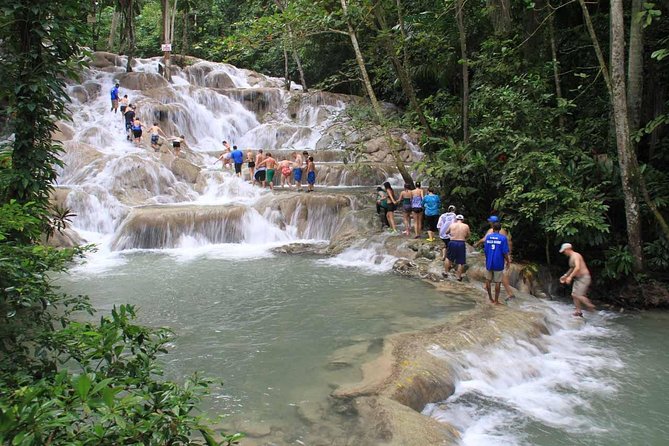 Falmouth Shore Excursion: Dunns River Falls Express Plus Souvenir Shopping - Exploring Dunns River Falls