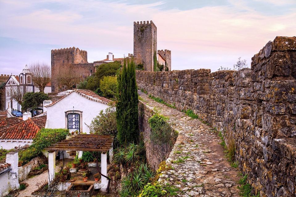 From Lisbon: Fatima, Batalha, Nazare, & Obidos Private Tour - Wander Obidos Medieval Walled Streets