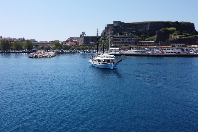 Full Day Cruise From Corfu in Classic Wooden Vessel, Swim & BBQ - Meeting Point and Pickup