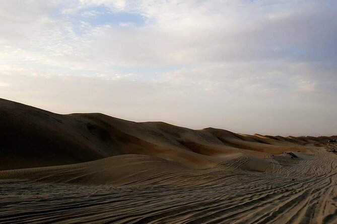 Gold Sunset Desert Safari ,Sand Boarding,Camel Ride,Inland Sea - Pickup and Dropoff