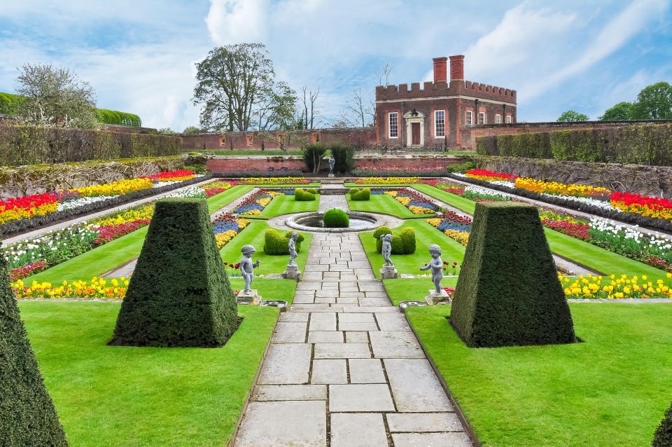 London: Hampton Court Palace Private Tour With Train Ride - Strolling Through the Palace Gardens