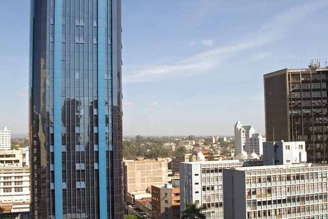 Nairobi City Walking Tour With Traditional Kenyan Lunch - Observing Regional Handicrafts