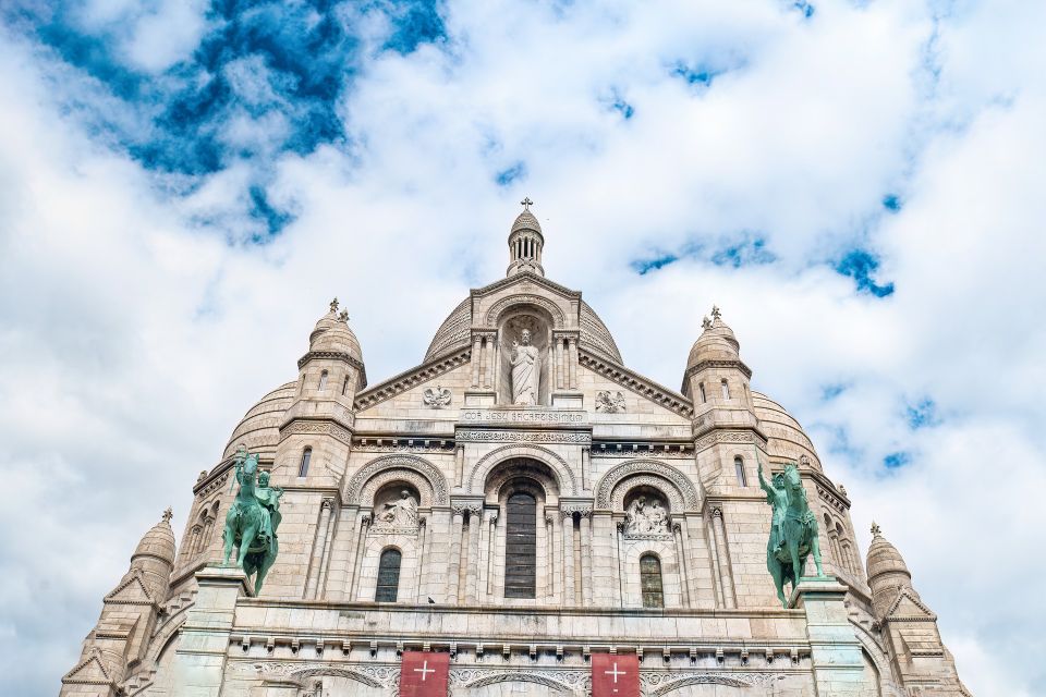 Paris: Charms of Montmartre Guided Walking Tour - Cobblestone Streets and Squares