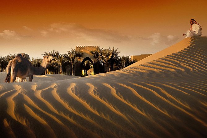 Red Dunes Safari By Quad Bike, Sandboarding, Camel Ride & BBQ Dinner - Unlimited Water and Soft Drinks Included