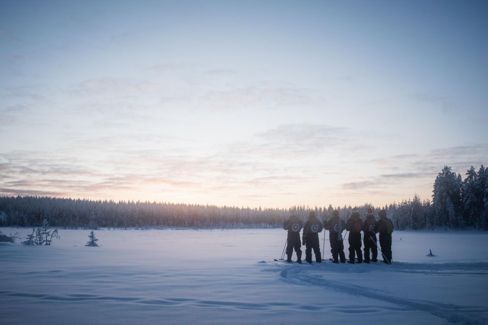 Rovaniemi: Backcountry Skiing Adventure - Warming Up by the Campfire