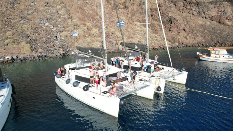 Santorini Catamaran Cruise With Swimming, Meal and Open Bar - Pickup and Drop-off Logistics