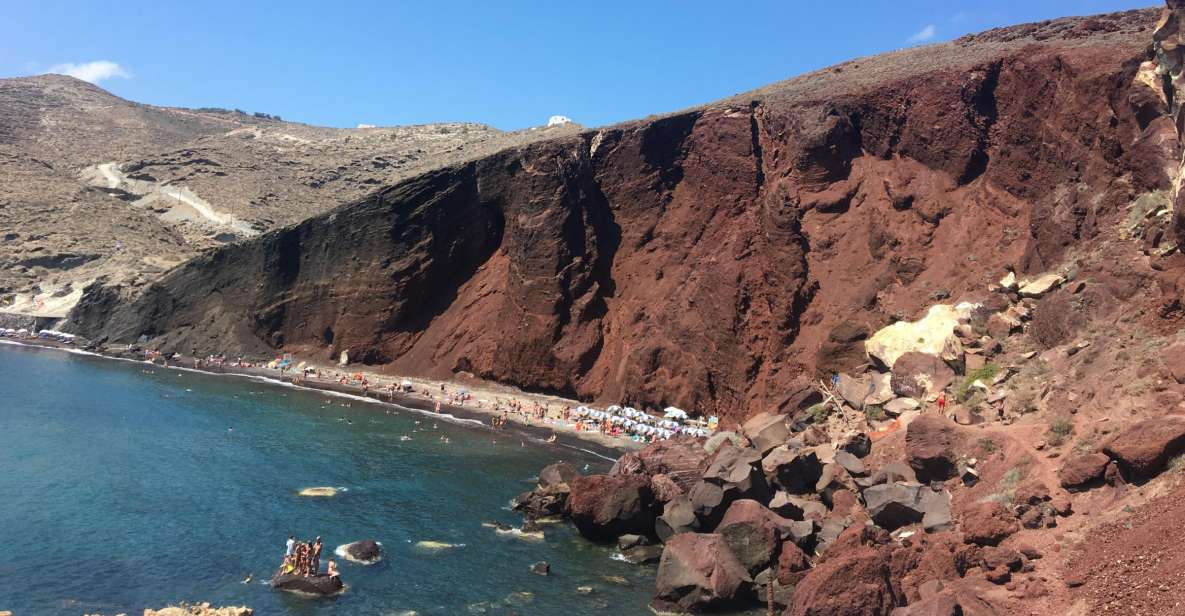 Santorini:Akrotiri Guided Tour & Motorboat Cruise With Lunch - Enjoy a Traditional Lunch