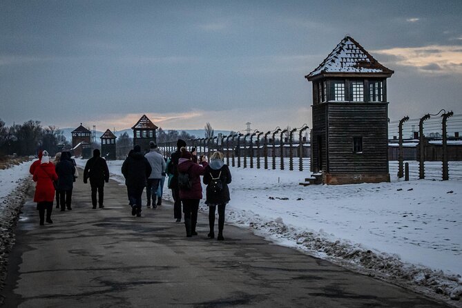 Auschwitz-Birkenau Guided Tour From Krakow With Ticket & Transfer - Exploring Auschwitz I and Birkenau