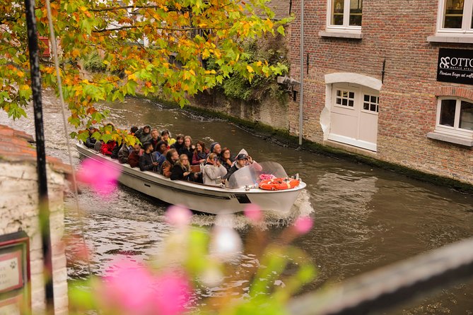 Bruges Audio Guided or Guided Day Trip With Canal Cruise Option From Paris - Round-Trip Transportation by Luxury Coach