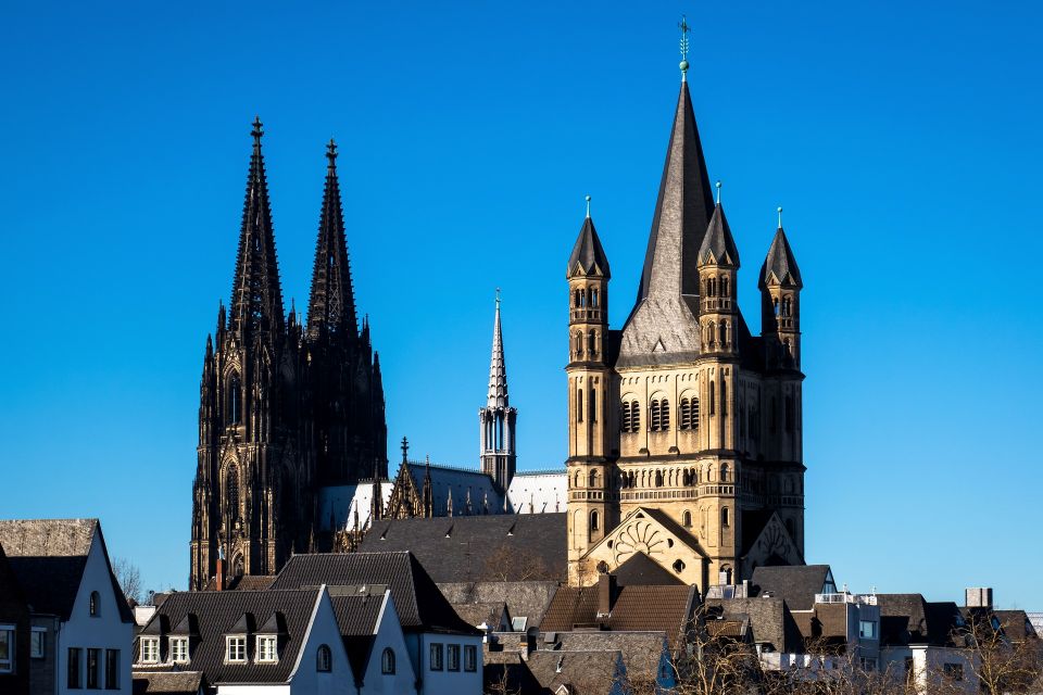 Cologne: Old Town Highlights Walking Tour - Discovering Roman Relics and Artifacts