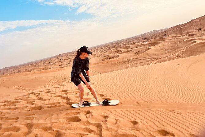 Dubai: Desert Safari Premium Dinner Quad Bike Camel and Sandboard - Adrenaline-Fueled Sandboarding