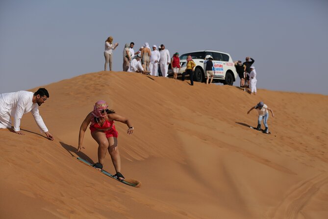 Dubai Desert Safari With Quad Bike, Dune Bashing, Camel Ride, Sand Boarding &Bbq - Booking Information and Policies