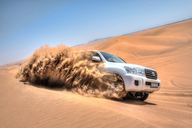 Dubai Evening Desert Safari & BBQ Dinner - Dune Bashing and Sandboarding