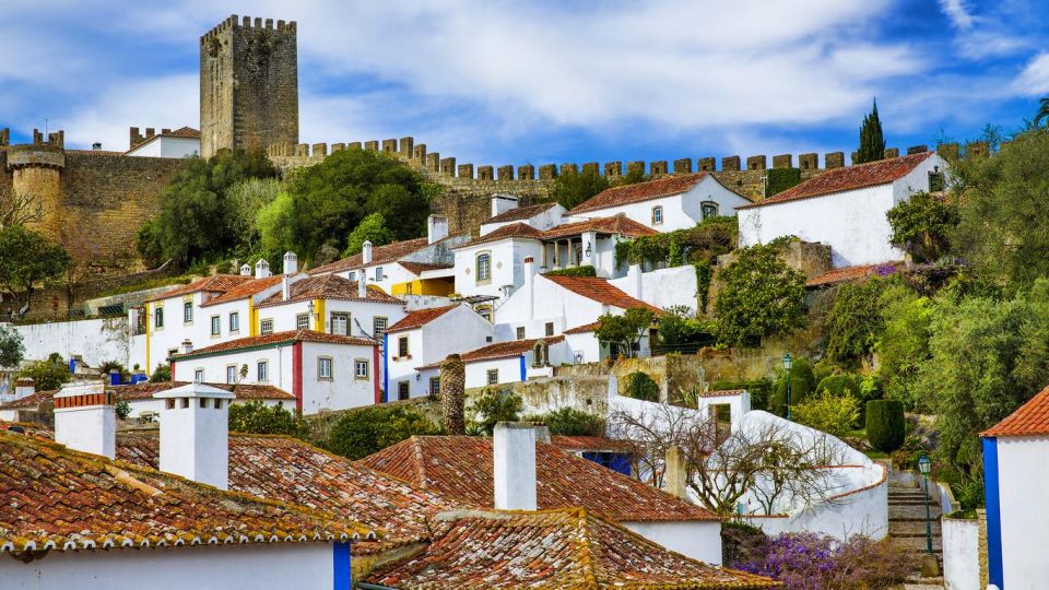 From Lisbon: Fatima, Nazare, Obidos & Batalha Full Day Tour - Traditional Village Lunch