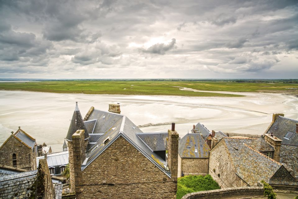 From Paris: Mont Saint-Michel Tour With Hotel Pickup Service - Free Time in the Village