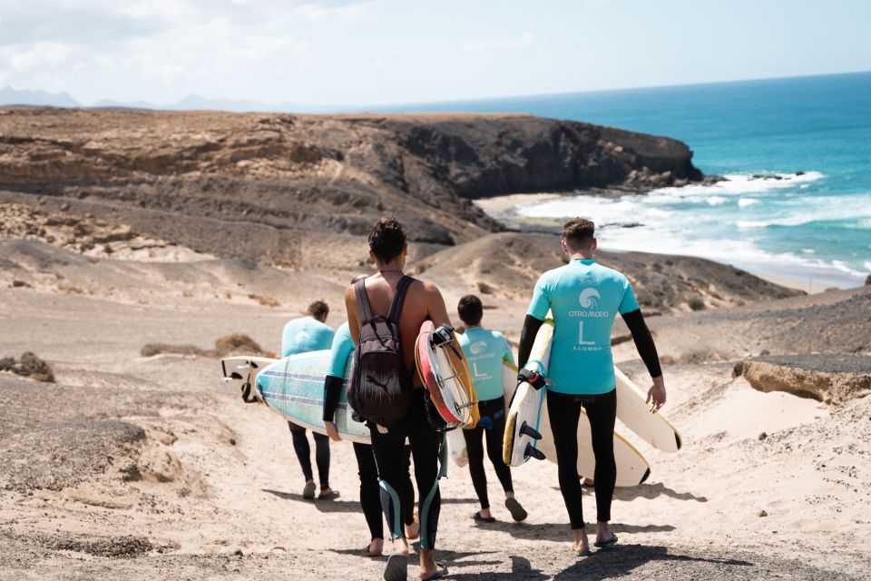 Learn to Surf at the White Beaches in Fuerteventuras South - Group Interaction