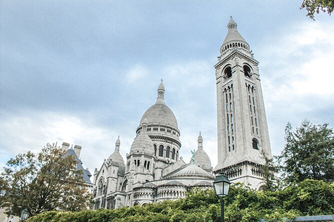 Montmartre: Secret Stories of Paris - Self-Guided Audio Tour - Exploring Montmartres Iconic Sites