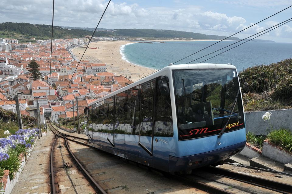 Private Obidos, Nazare, Alcobaca and Mafra Full Day Tour - Fishing Village of Nazaré