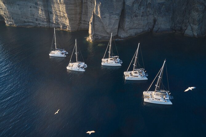 Santorini: Caldera Luxury Catamaran Cruise With Meal & Drinks - Included Greek Barbecue Meal