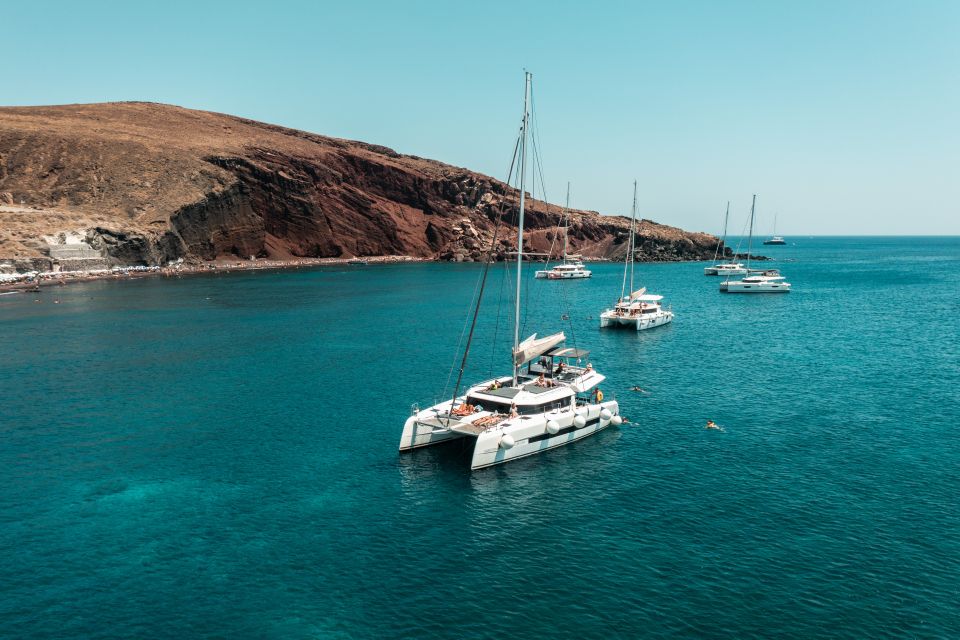 Santorini: Majestic Catamaran Cruise With Meal and Drinks - What to Bring and Restrictions