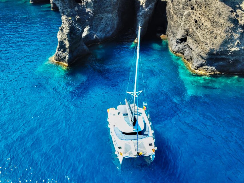 Santorini: Private Catamaran Excursion With Food and Drinks - Transportation and Pick-up