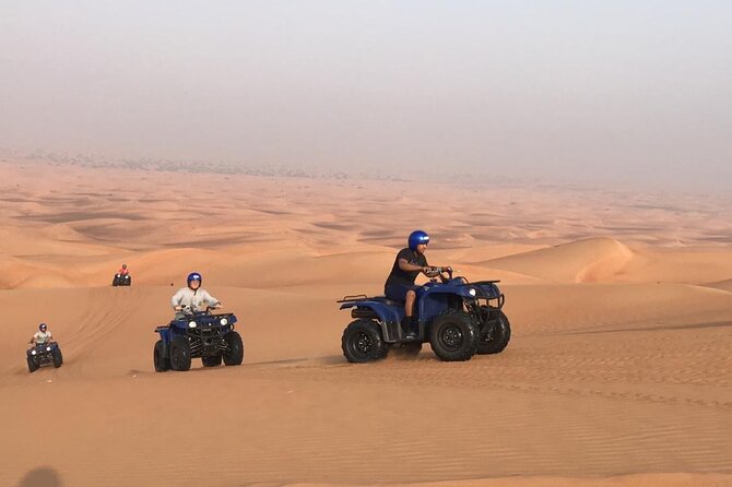 Self Drive Quad Bike in Open Desert With Sand Boarding and Camels - Exploring the Desert Landscape