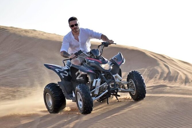 Sunset Dubai Desert Safari With BBQ & Entertainment - Dune Bashing and Sandboarding