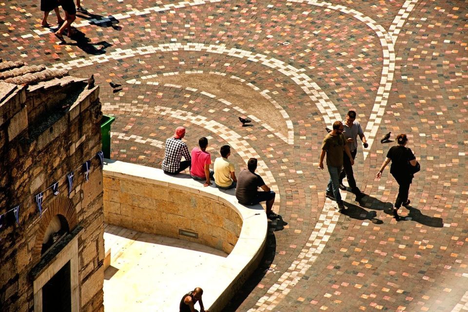 Athens at Twilight Night Tour With Drinks and Meze Dishes - Nightlife Traditions and Atmosphere