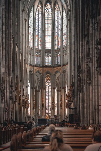 Cologne Highlights Privat Walking Tour & Panoramic Boat Trip - Town Hall Captivating Stories