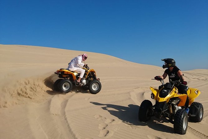 Desert Safari Adventure 4 Hours From Doha With Pickup - Exploring the Inland Sea