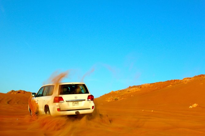 Dubai Desert Safari With Dinner in PRIVATE 4x4 Vehicle - Sand Boarding