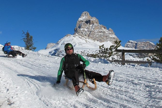 From Bolzano - Snowmobile + Sledding and The Great Dolomites Road Private Tour - Thrilling Snow Activities