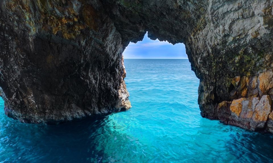 From Kefalonia: Blue Cave Boat Cruise & Shipwreck Photo Stop - Enjoying Mounda Beach